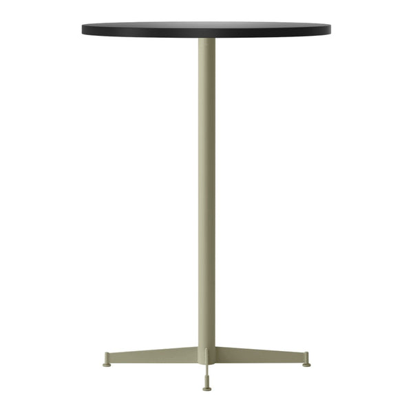 Black round table top with a sleek light green metal base and minimalist design. Ideal for modern decor.