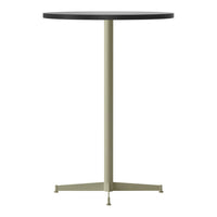 Round black tabletop with a sleek olive green metal base, featuring a minimalist design and modern aesthetic.