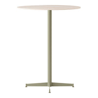 Round tabletop in light wood finish with a muted green metal base, featuring a minimalist design.