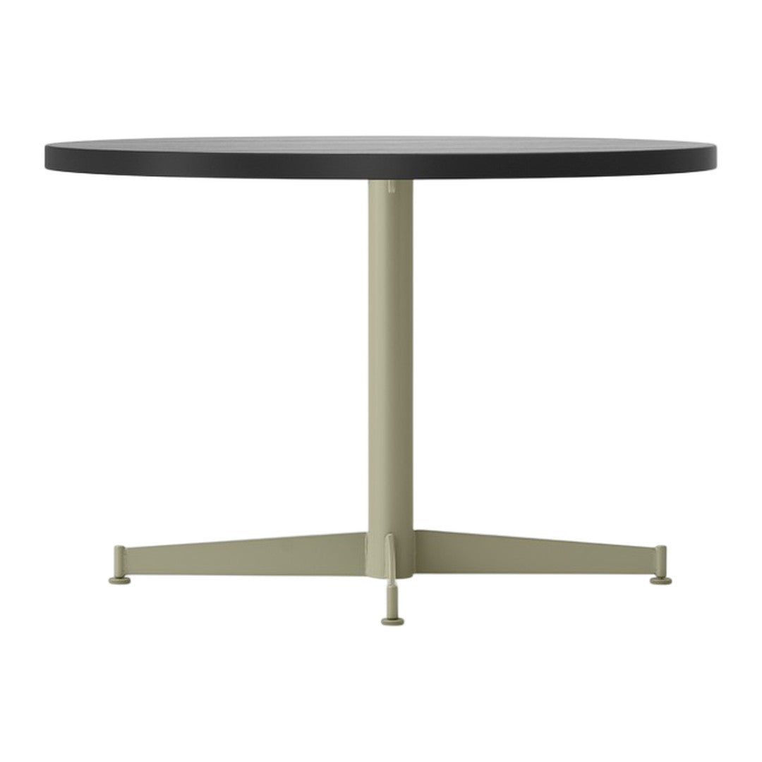 Black round tabletop with a minimalist light green metal base. Clean, modern design suitable for any decor.