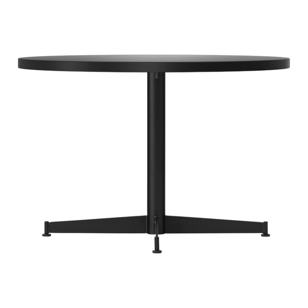 Round black table with a sleek matte finish and modern design, featuring a minimalist black metal base.