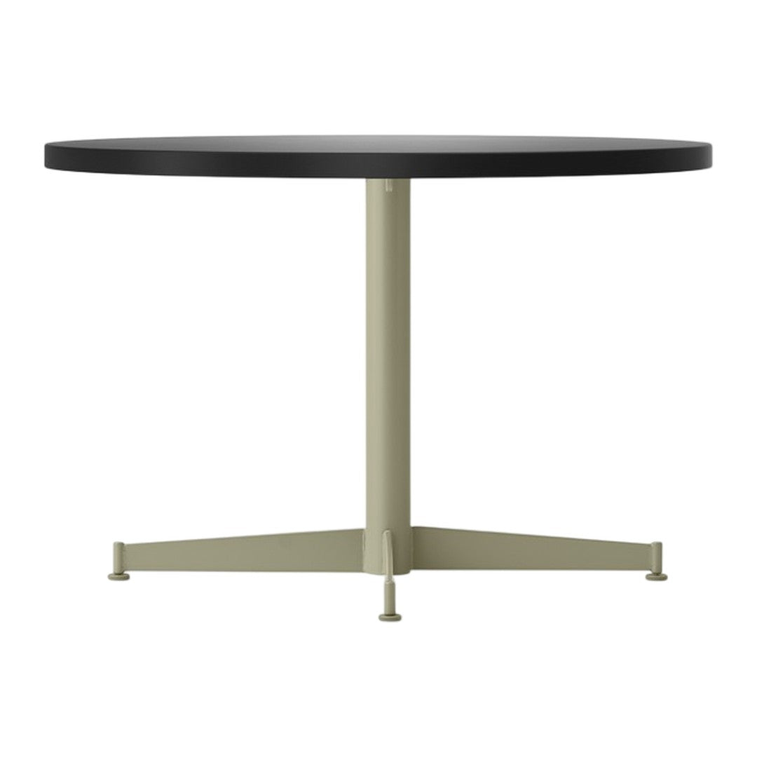 Black round tabletop with a cream-colored metal base and three legs, featuring a sleek, modern design.