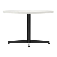 Round white tabletop with a sleek black tripod base, perfect for modern decor.