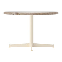 Round table with a textured, gray marble surface and a smooth, cream-colored base. Ideal for modern decor.