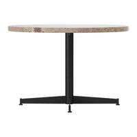 Round table with a light stone top and a sleek black metal base, featuring a minimalist design and neutral colors.