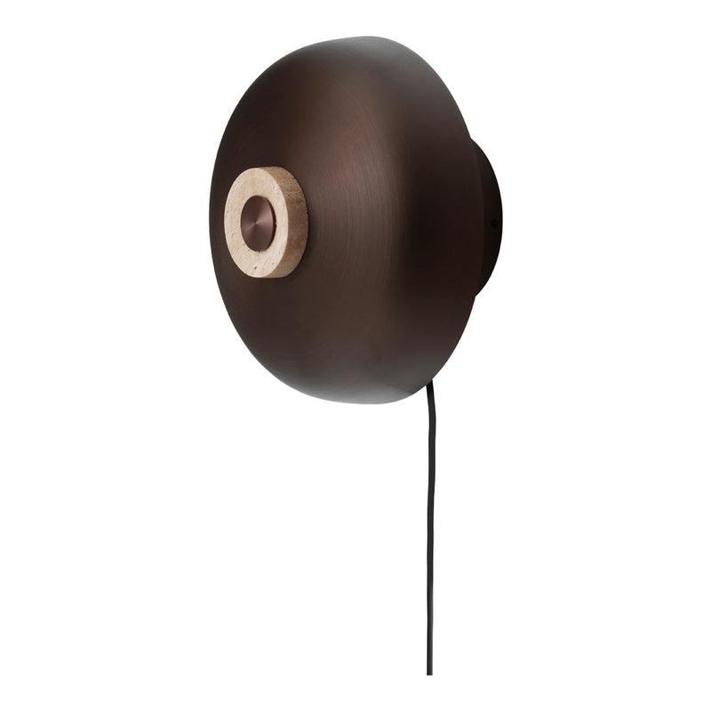 Brown wall lamp with a smooth metallic finish and a contrasting light-colored wooden accent. Modern design element.