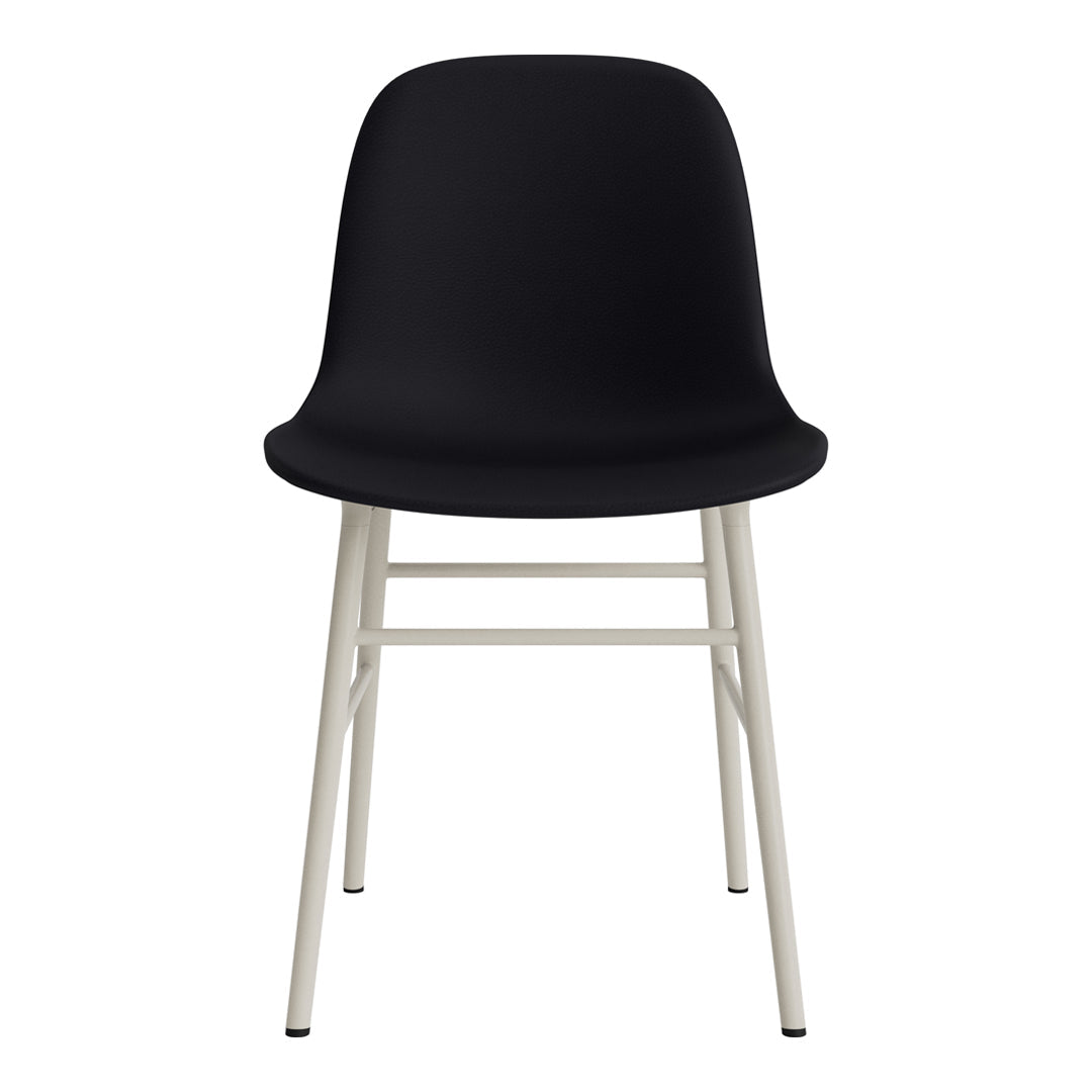 Black chair with a smooth, minimalist design and light gray metal legs. Perfect for modern decor.