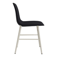 Black upholstered chair with a sleek design and light gray metal legs, creating a modern and minimalist look.