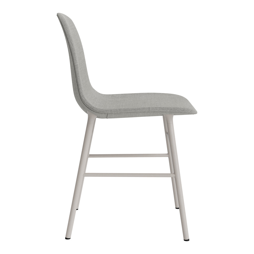Gray upholstered dining chair with sleek metal legs, featuring a minimalist design and smooth lines.