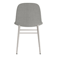 Gray upholstered chair with a smooth texture and minimalist white metal legs. Perfect for modern decor.