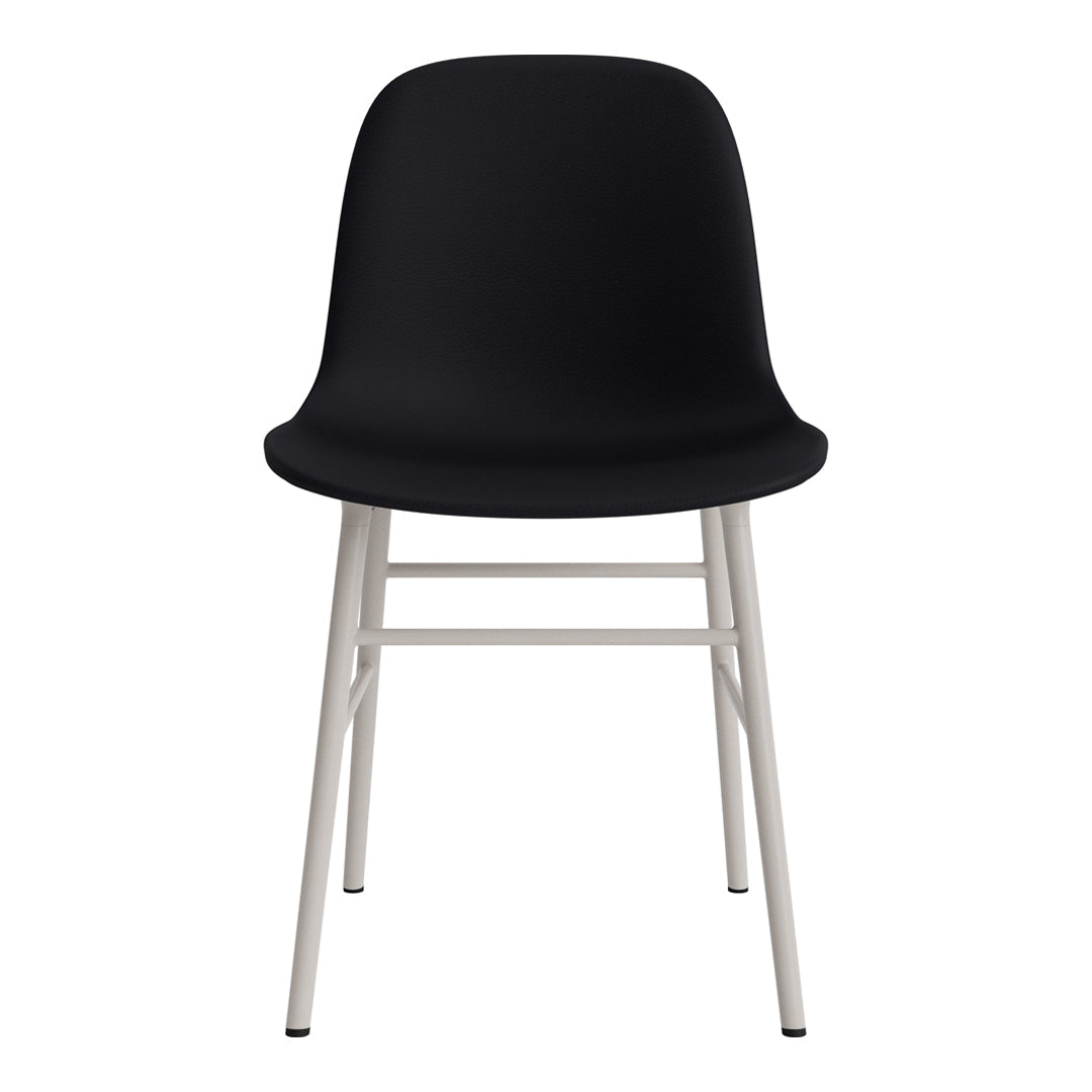 Modern black chair with smooth curves and minimalist white legs, perfect for contemporary decor.