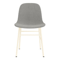Gray upholstered chair with a smooth texture and cream-colored wooden legs. Ideal for modern interiors.