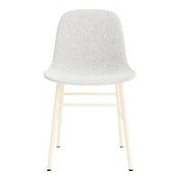 Gray upholstered chair with a smooth texture and light wooden legs, offering a minimalist design.