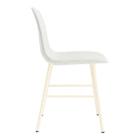 Light gray upholstered chair with a sleek design and natural wood legs, perfect for minimalist decor.