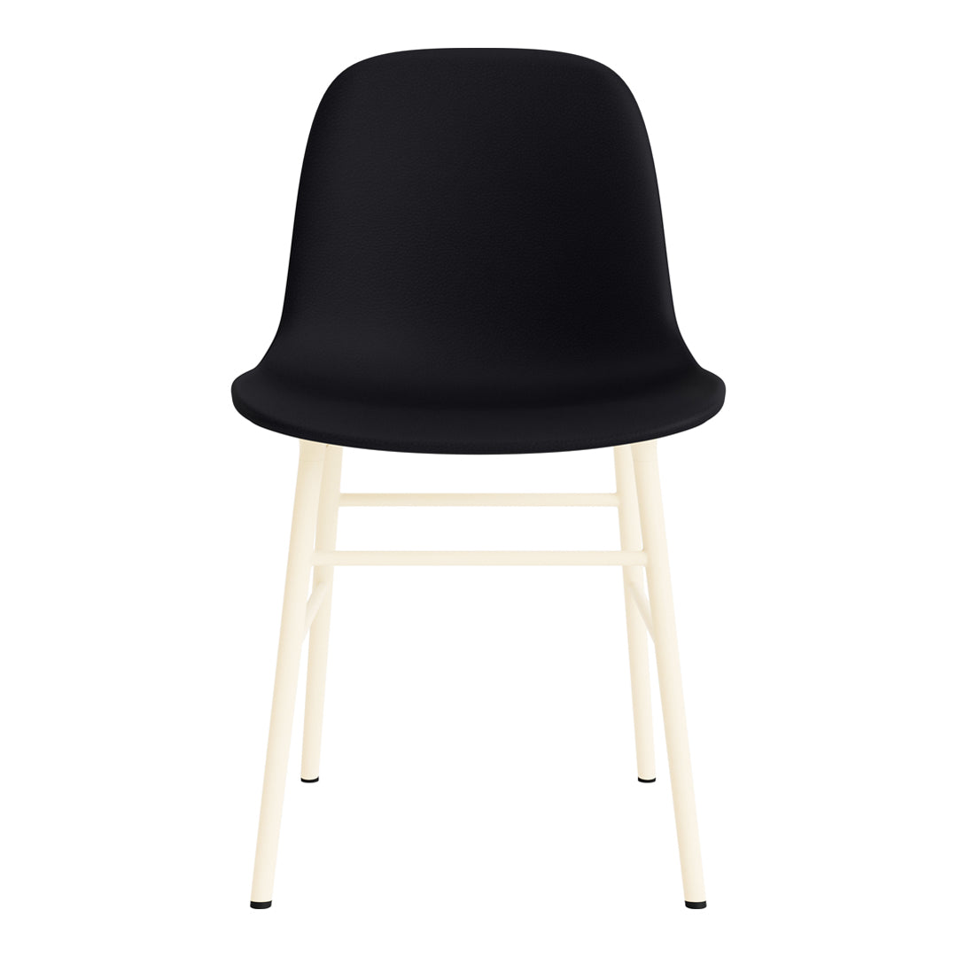 Black plastic chair with a smooth, modern design and light wooden legs. Minimalist style for contemporary spaces.