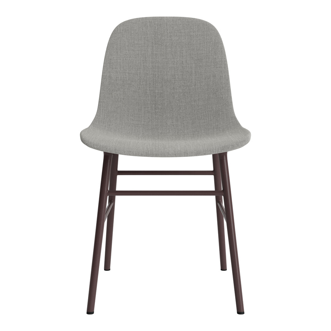 Grey fabric chair with minimalist design and dark brown wooden legs, perfect for modern interiors.