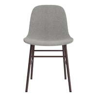 Grey fabric chair with minimalist design and dark brown wooden legs, perfect for modern interiors.