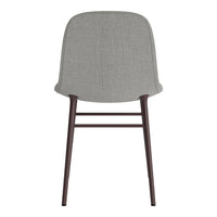 Gray fabric chair with a smooth texture and dark wood legs, featuring a minimalist design. Perfect for modern decor.