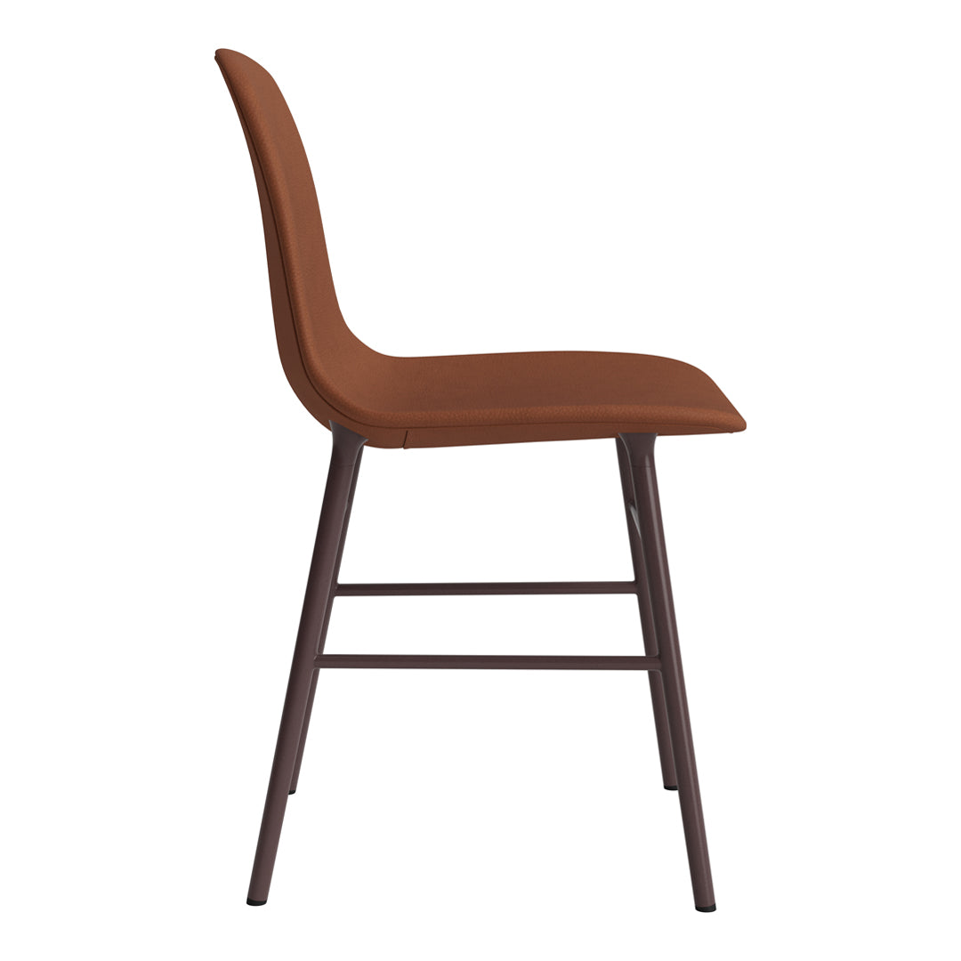 Brown upholstered chair with a smooth finish and sleek, dark wooden legs. Modern and minimalist design.
