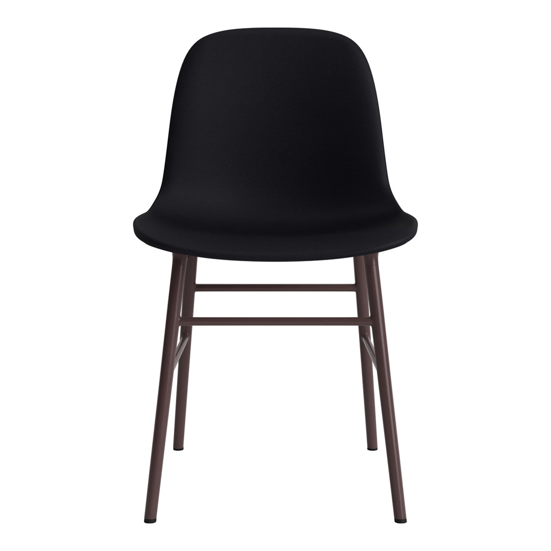 Modern black chair with smooth, curved seat and sleek brown legs, offering a minimalist style for any decor.