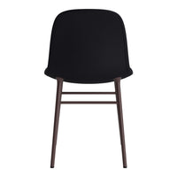 Black upholstered chair with sleek, minimal design and dark wood legs, perfect for modern interiors.
