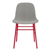 Gray upholstered chair with vibrant red legs, featuring a modern and minimalistic design. Ideal for any decor style.