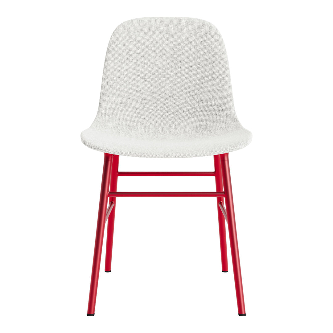 White fabric chair with a smooth texture and bold red metal legs, featuring a minimalist design.