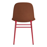 Brown upholstered chair with sleek red metal legs, featuring a modern, minimalist design.