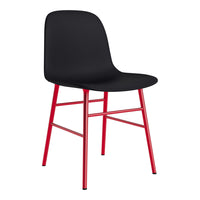 Black chair with a smooth surface and vibrant red metal legs, featuring a minimalist and modern design.