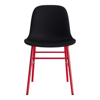 Black chair with a sleek, minimalist design featuring red metal legs, showcasing a modern color contrast.