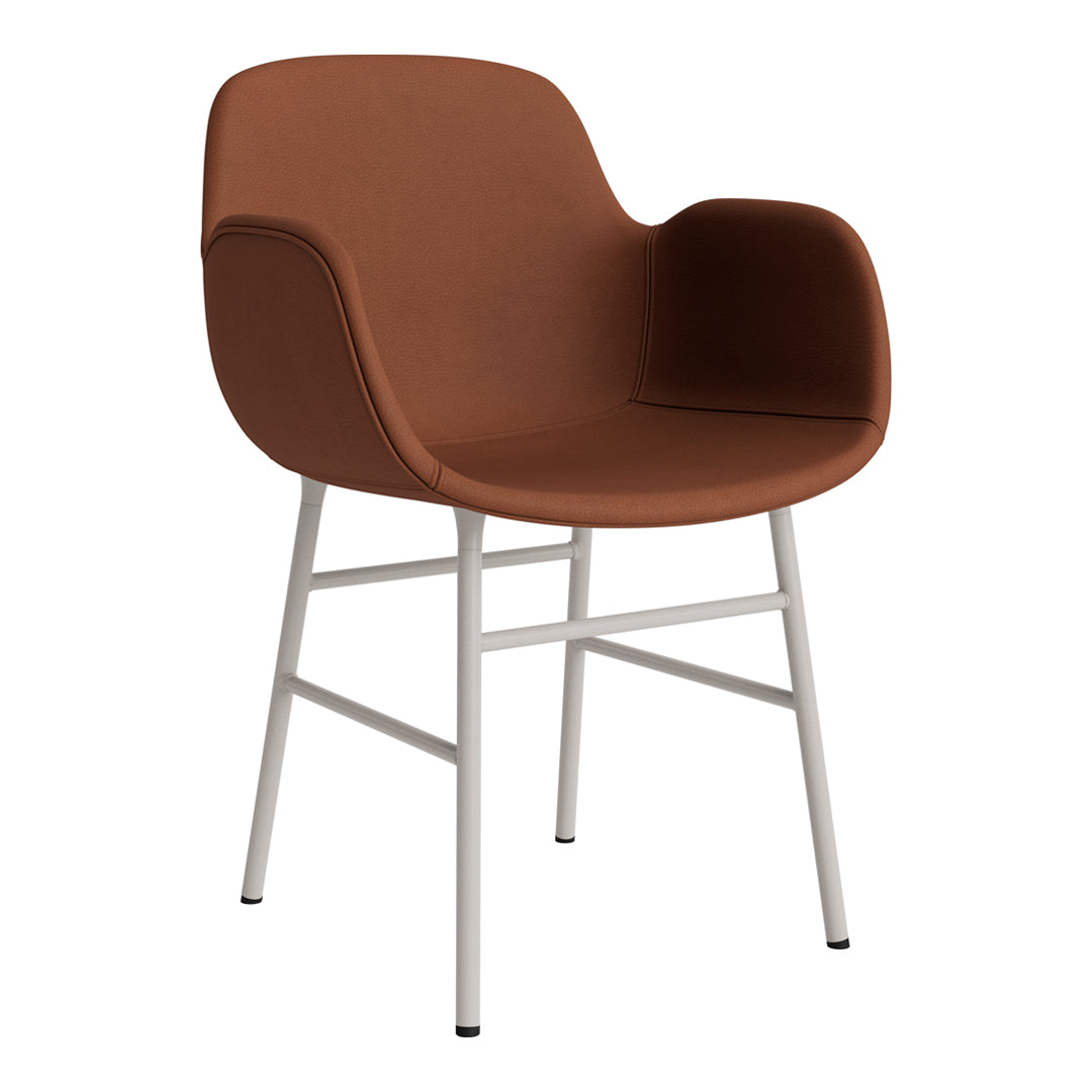 Brown upholstered chair with smooth curves and white metal legs. Modern design for stylish interiors.