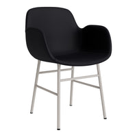 Black upholstered chair with minimalist design and sleek silver legs. Modern and stylish for any room.