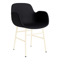 Black upholstered chair with a smooth finish and cream-colored metal legs, featuring a minimalist design.