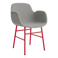 Gray upholstered chair with a modern design and vibrant red metal legs. Perfect for stylish interiors.