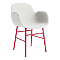 Modern armchair with a soft gray fabric seat and vibrant red metal legs. Stylish and contemporary design for any space.