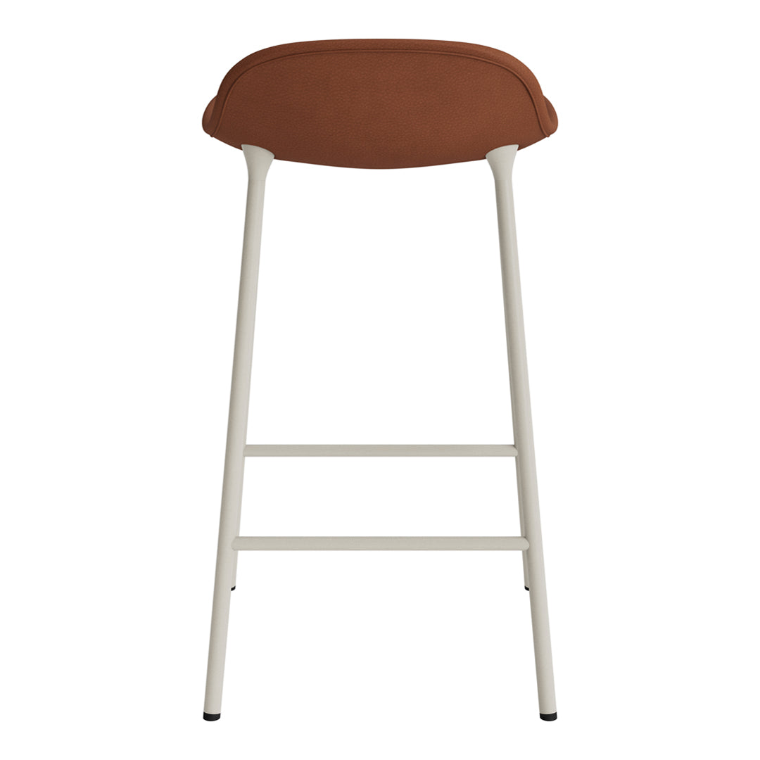 Brown upholstered bar stool with a sleek cream metal frame. Simple, modern design with a clean aesthetic.