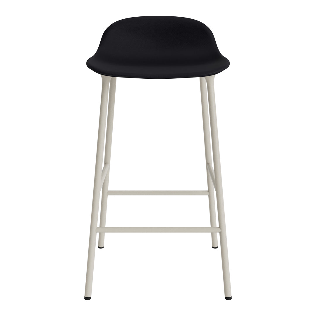 Black bar stool with a minimalist design and white metal legs, offering a modern aesthetic. Perfect for stylish spaces.