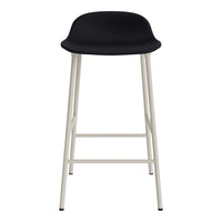 Black bar stool with a minimalist design and white metal legs, offering a modern aesthetic. Perfect for stylish spaces.