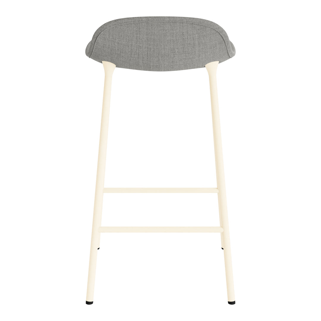 Light wooden bar stool with a soft gray upholstered seat, featuring a minimalist design.