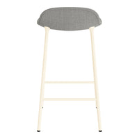 Light wooden bar stool with a soft gray upholstered seat, featuring a minimalist design.