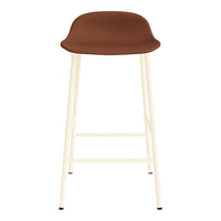 Brown cushioned seat with cream-colored legs, sleek modern design, perfect for contemporary spaces.