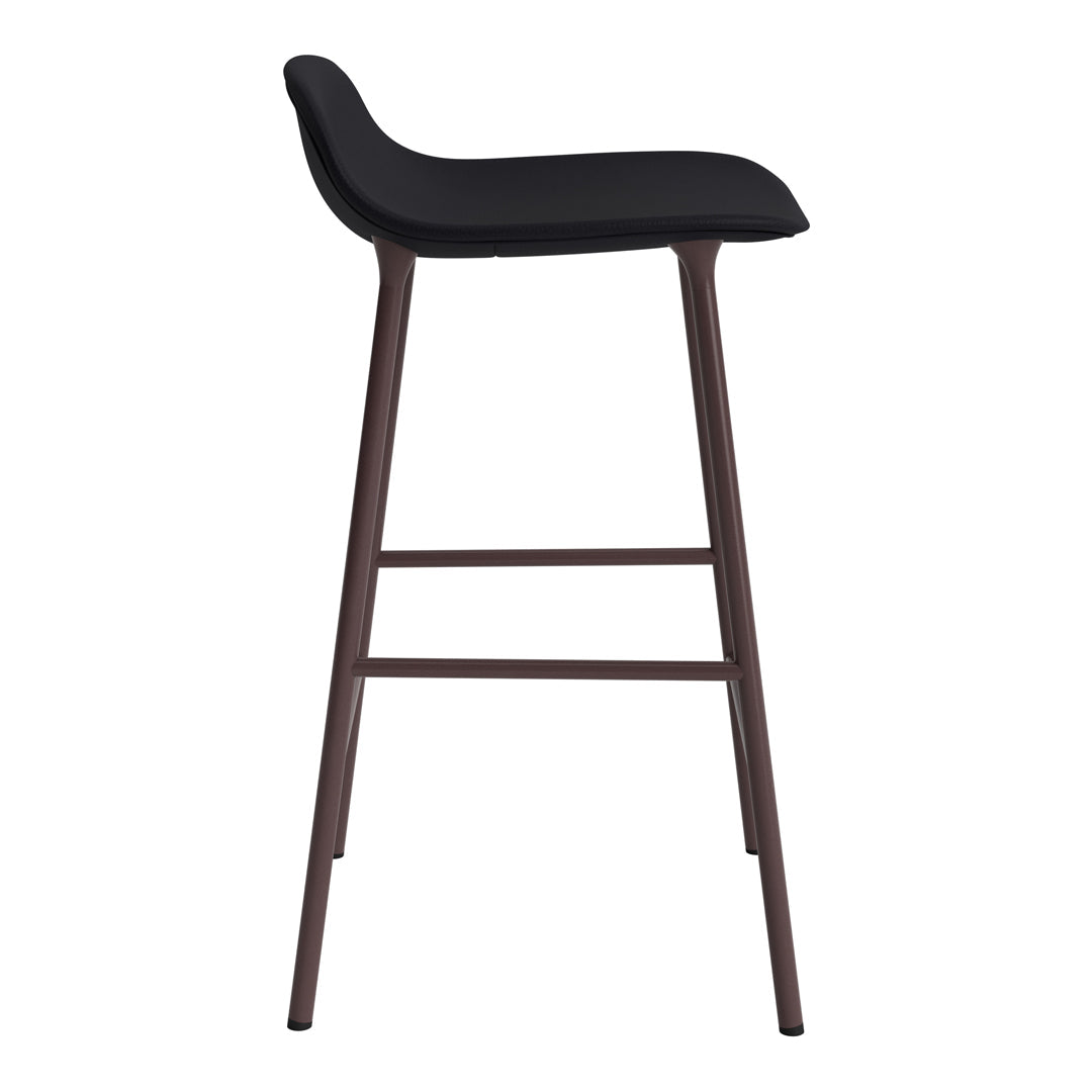 Black upholstered bar stool with a smooth finish and dark brown wooden legs, featuring a sleek, modern design.