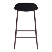Black upholstered bar stool with sleek brown metal legs, featuring a minimalist design and smooth, modern lines.