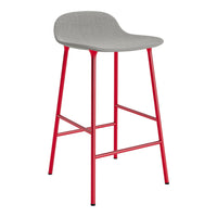 Gray upholstered bar stool with vibrant red metal legs, modern design perfect for any stylish space.