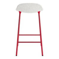 Red metal bar stool with a textured white seat, offering a modern and vibrant look. Perfect for contemporary decor.