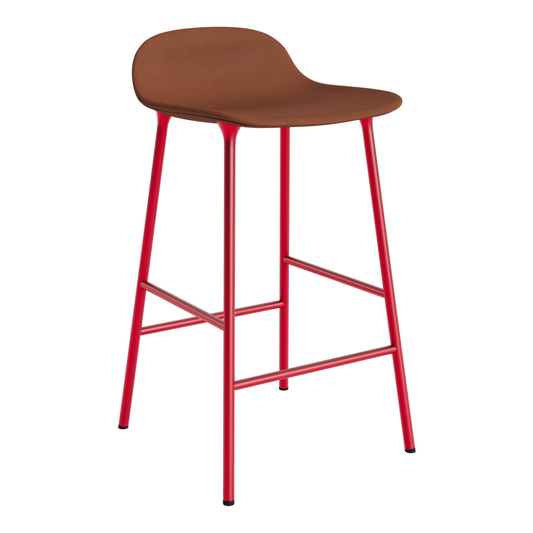 Brown seat with smooth finish on bold red metal legs, perfect for modern bar or kitchen décor.