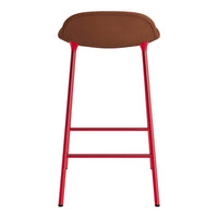 Red metal bar stool with a brown cushioned seat, featuring a sleek, modern design. Ideal for contemporary spaces.