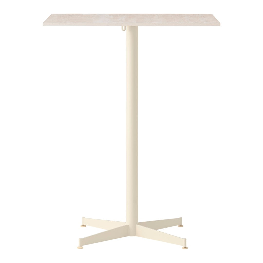 Modern cream-colored table with a smooth top and a sturdy crossbase, perfect for minimalist decor.