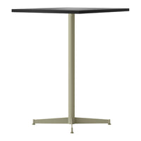 Modern black square tabletop with a minimalist light green metal base. Ideal for contemporary settings.