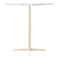Modern square table with a white marble top and a sleek cream-colored base. Minimalist design for any space.